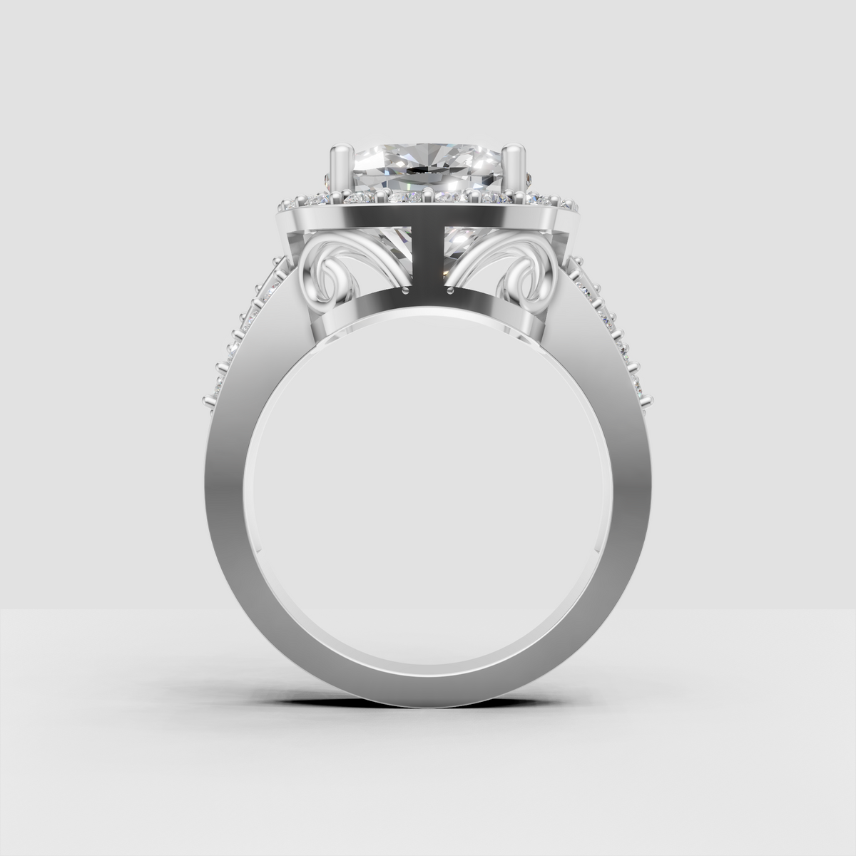 Vintage-style cushion halo diamond ring with intricate gallery