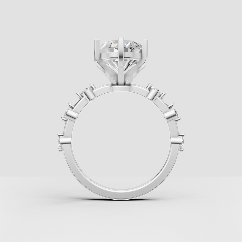 Modern pear cut diamond engagement ring yellow gold