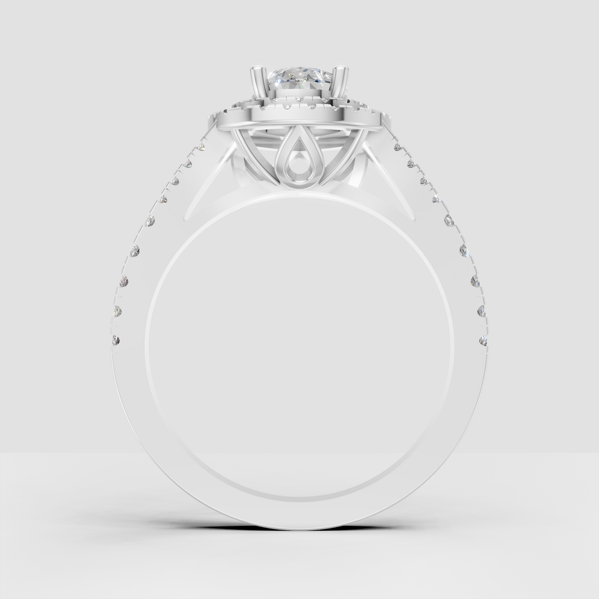 Side view of pear-shaped Diamond engagement ring with open cathedral gallery