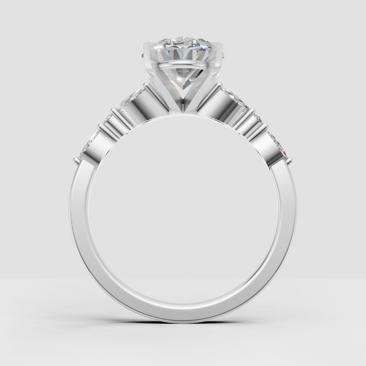 Elongated oval diamond ring with four-prong setting