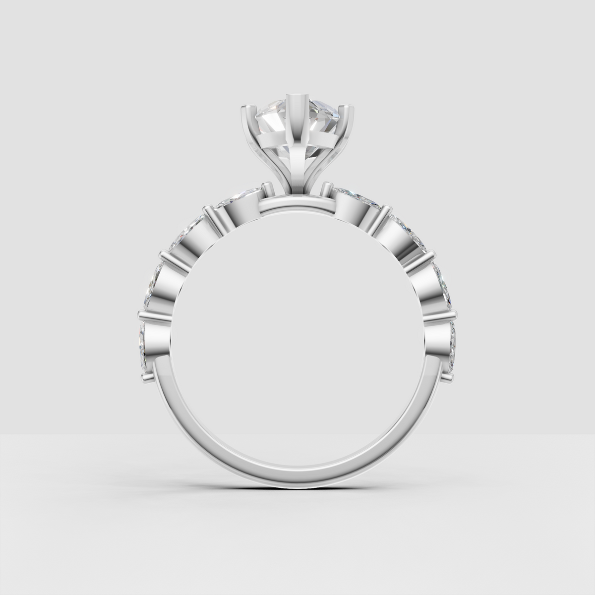 Marquise diamond engagement ring with round side stones