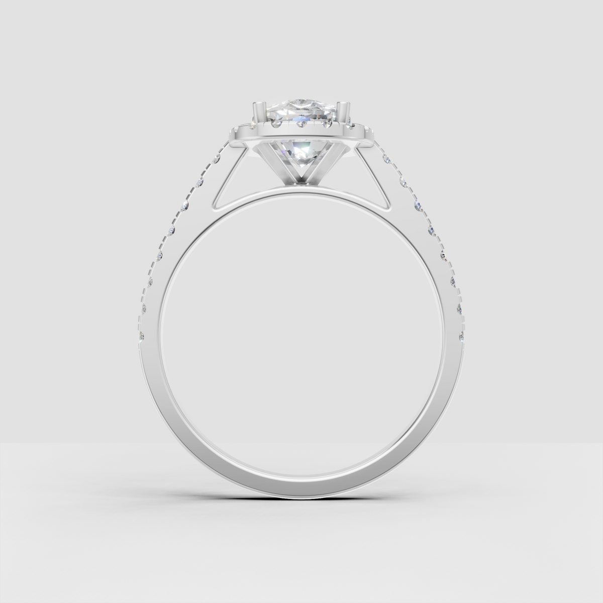 Yellow gold elongated cushion halo ring with sparkling pavé side stones