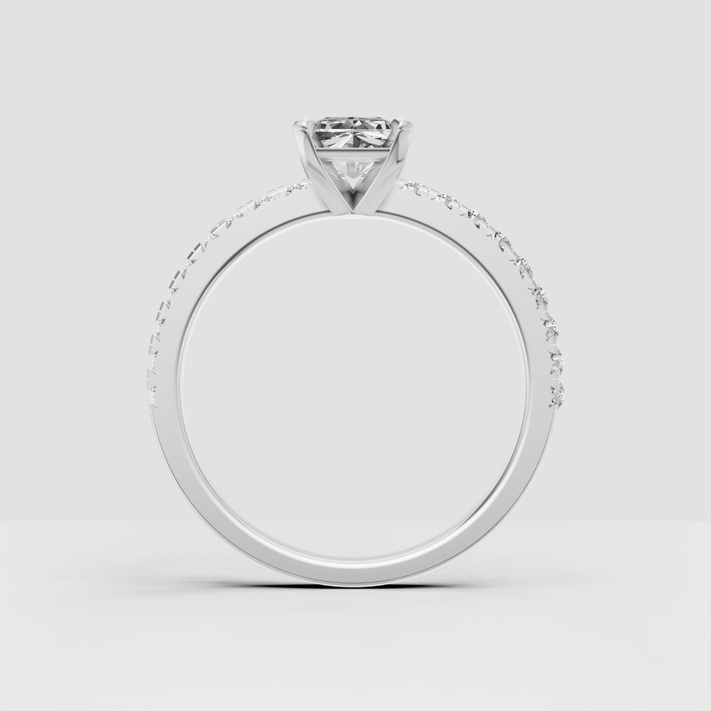 Side view of radiant-cut Diamond engagement ring with elevated four-prong setting