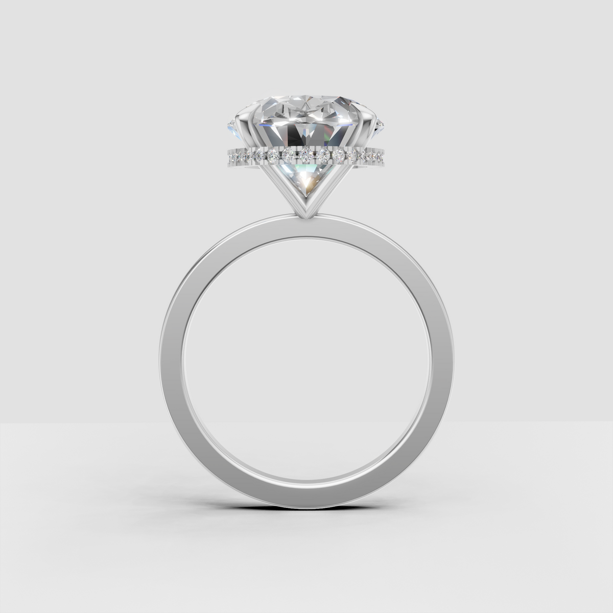 Classic gold oval diamond engagement ring with hidden halo