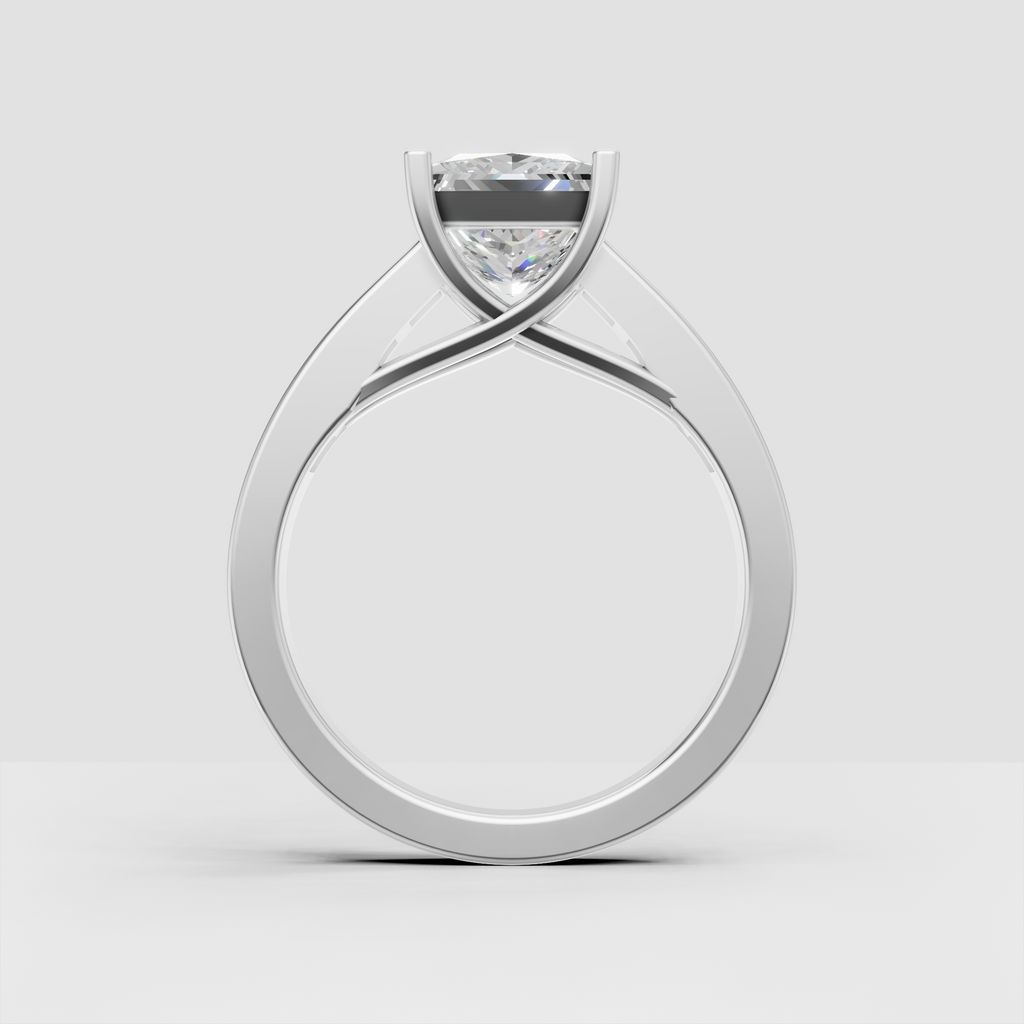 Princess cut solitaire engagement ring with channel set diamond band