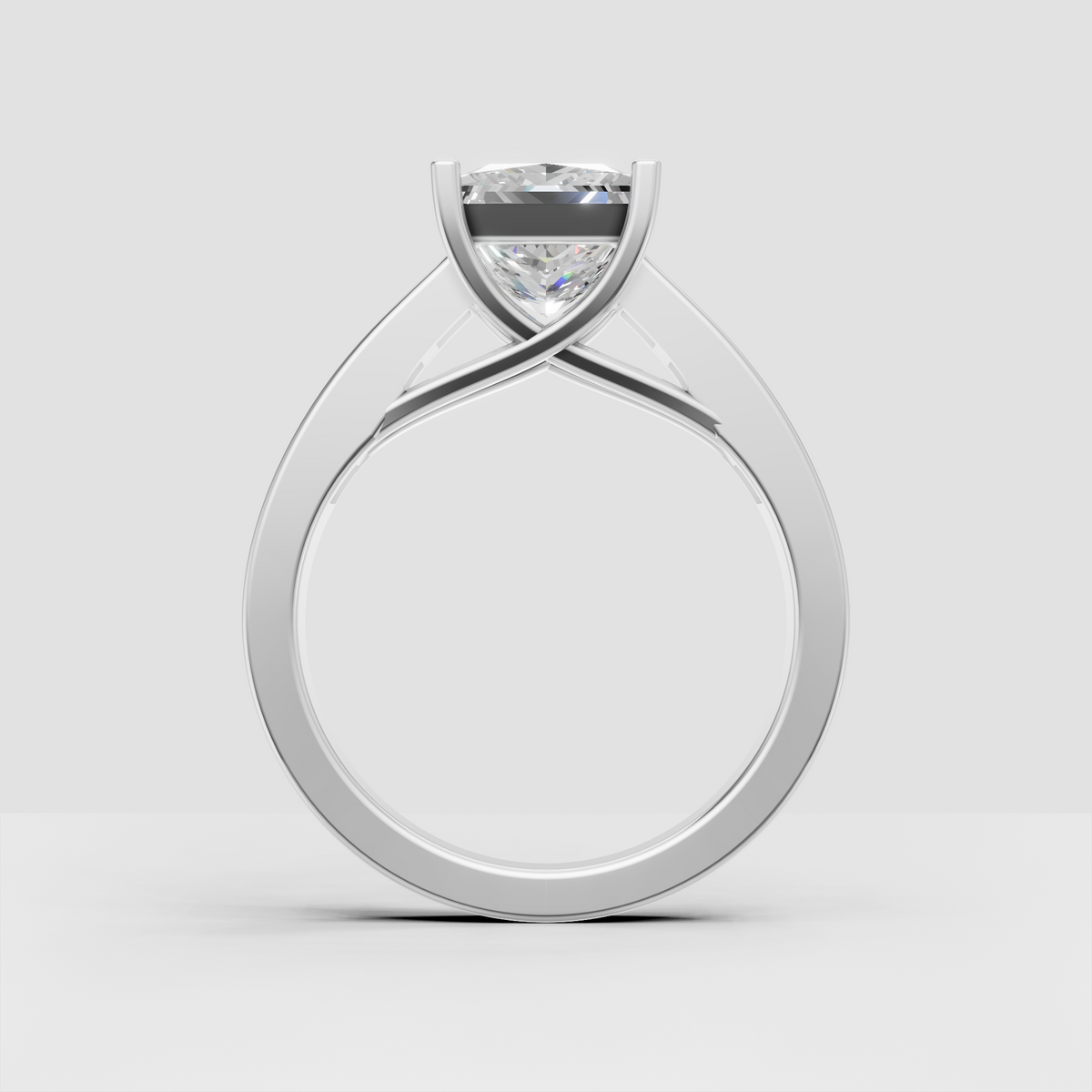 Princess cut solitaire engagement ring with channel set diamond band