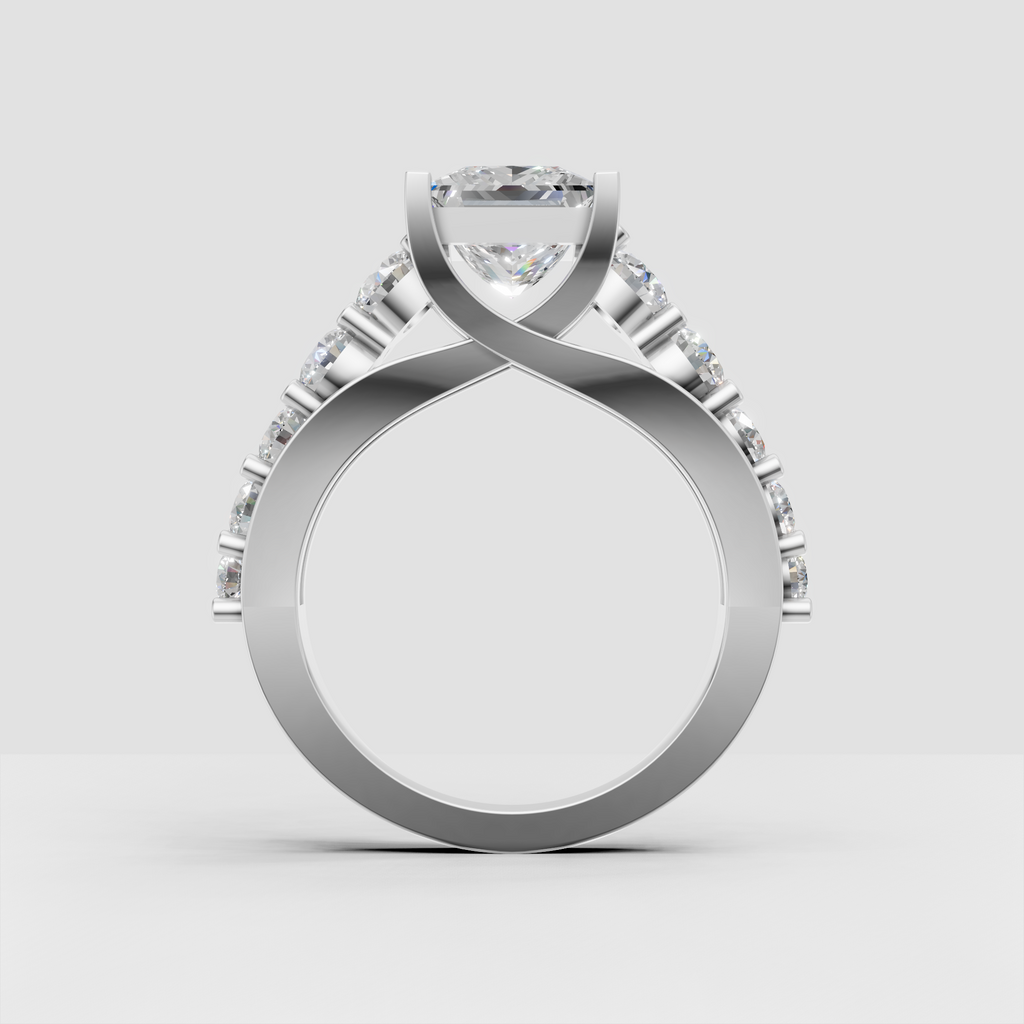 Princess diamond ring with four prongs and graduated round side stones