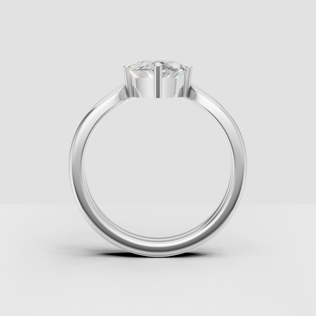 Marquise diamond ring featuring graceful curved gold shoulders