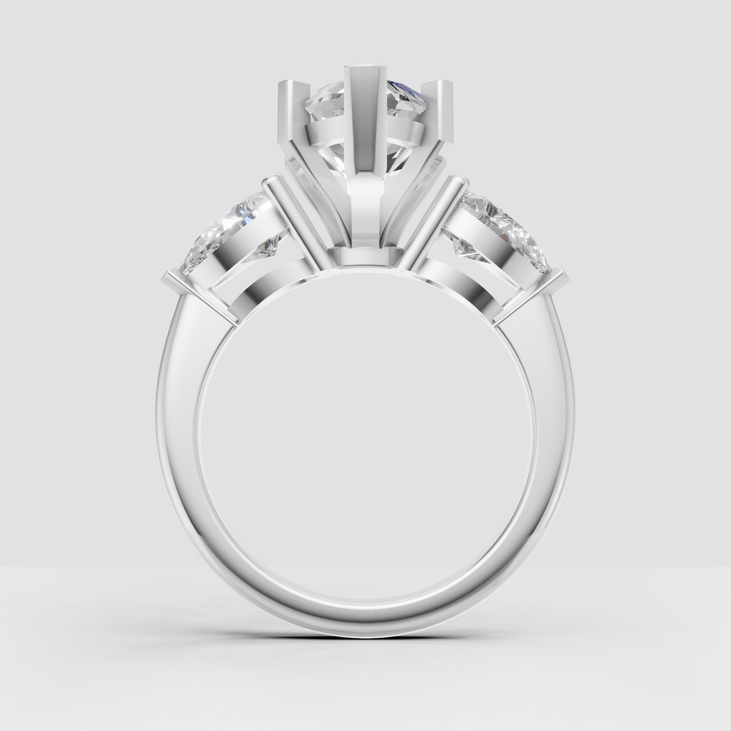 Classic three stone diamond ring with marquise center