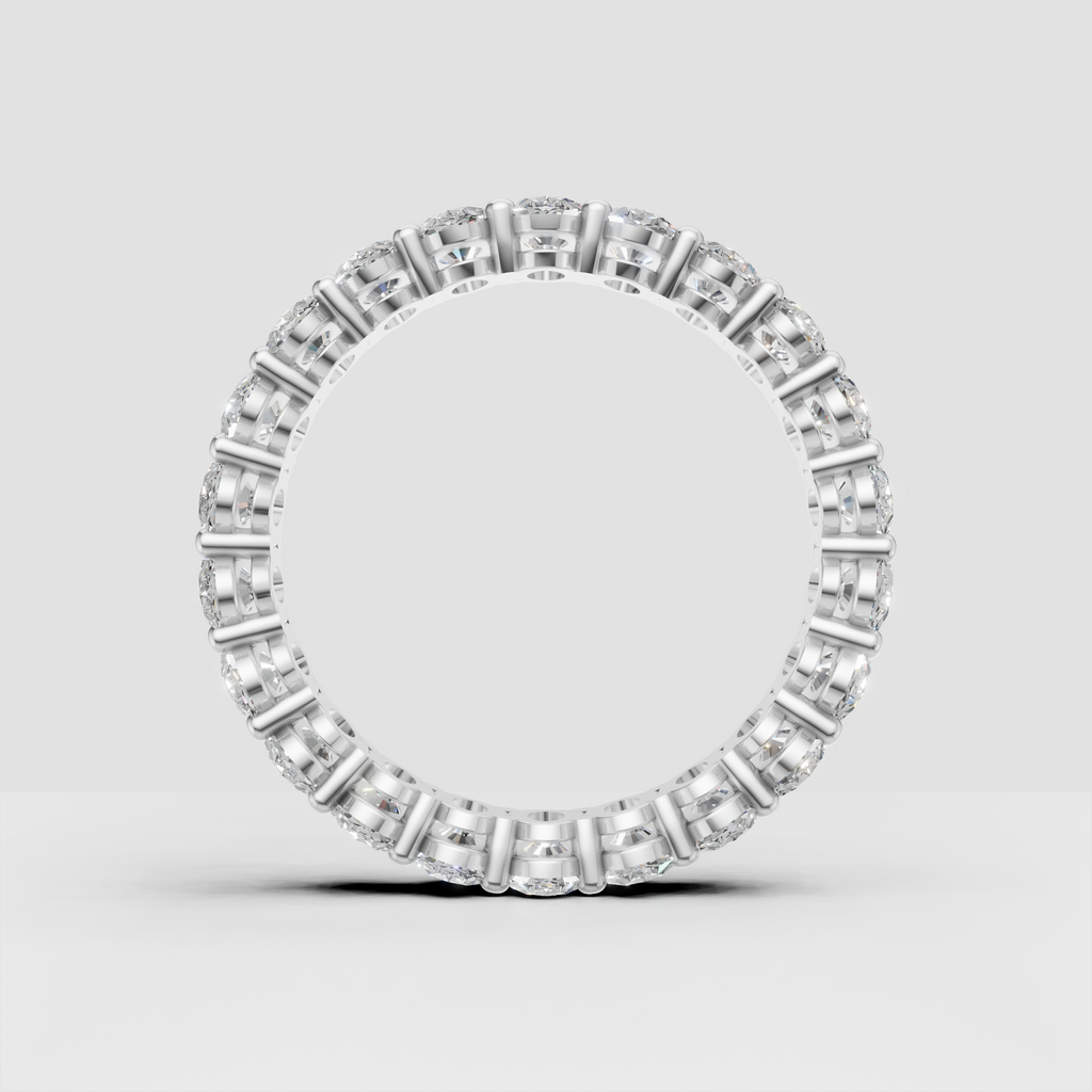 Oval diamond shared prong wedding band side detail