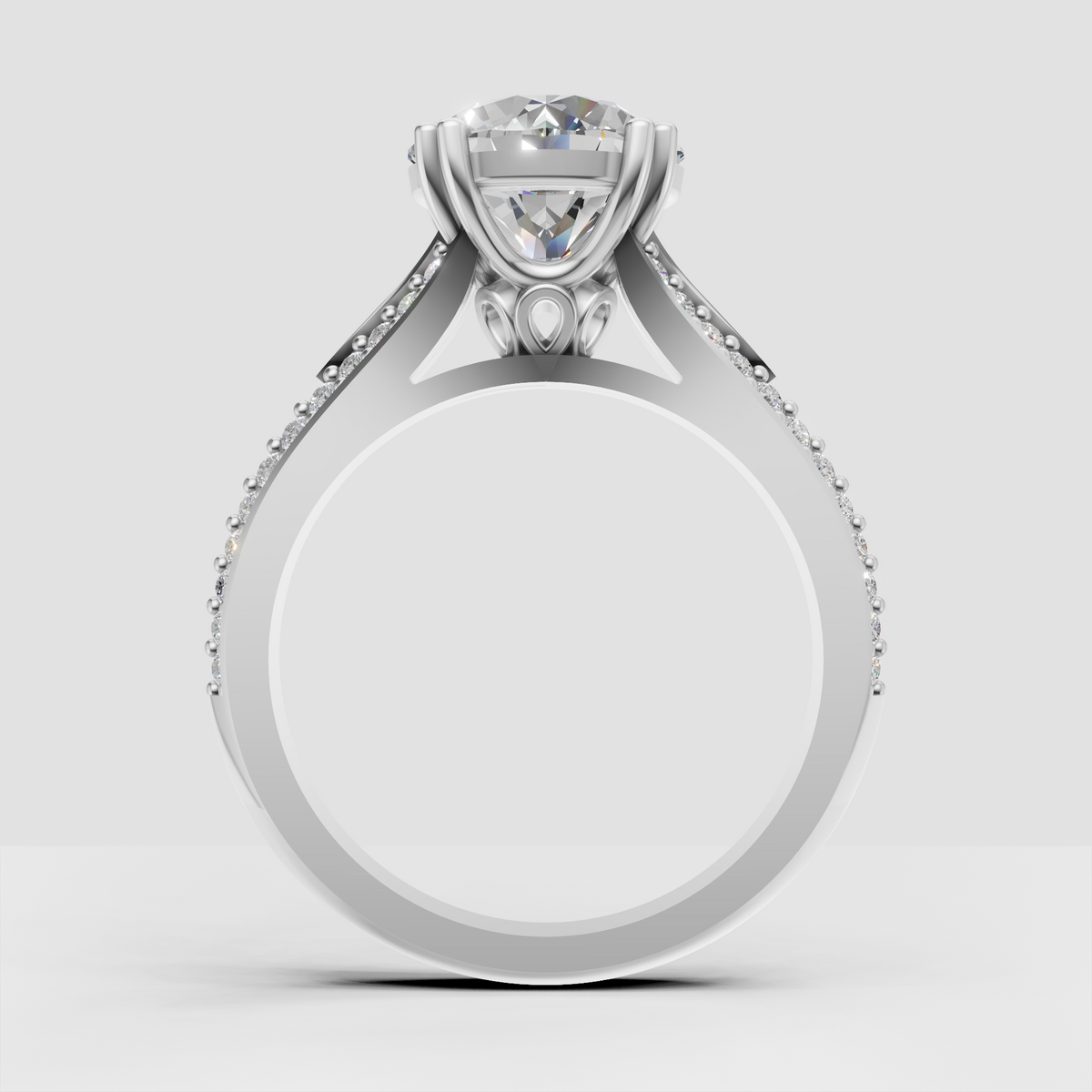 Elegant Round Cut Diamond ring featuring a polished gold band and pavé detailing
