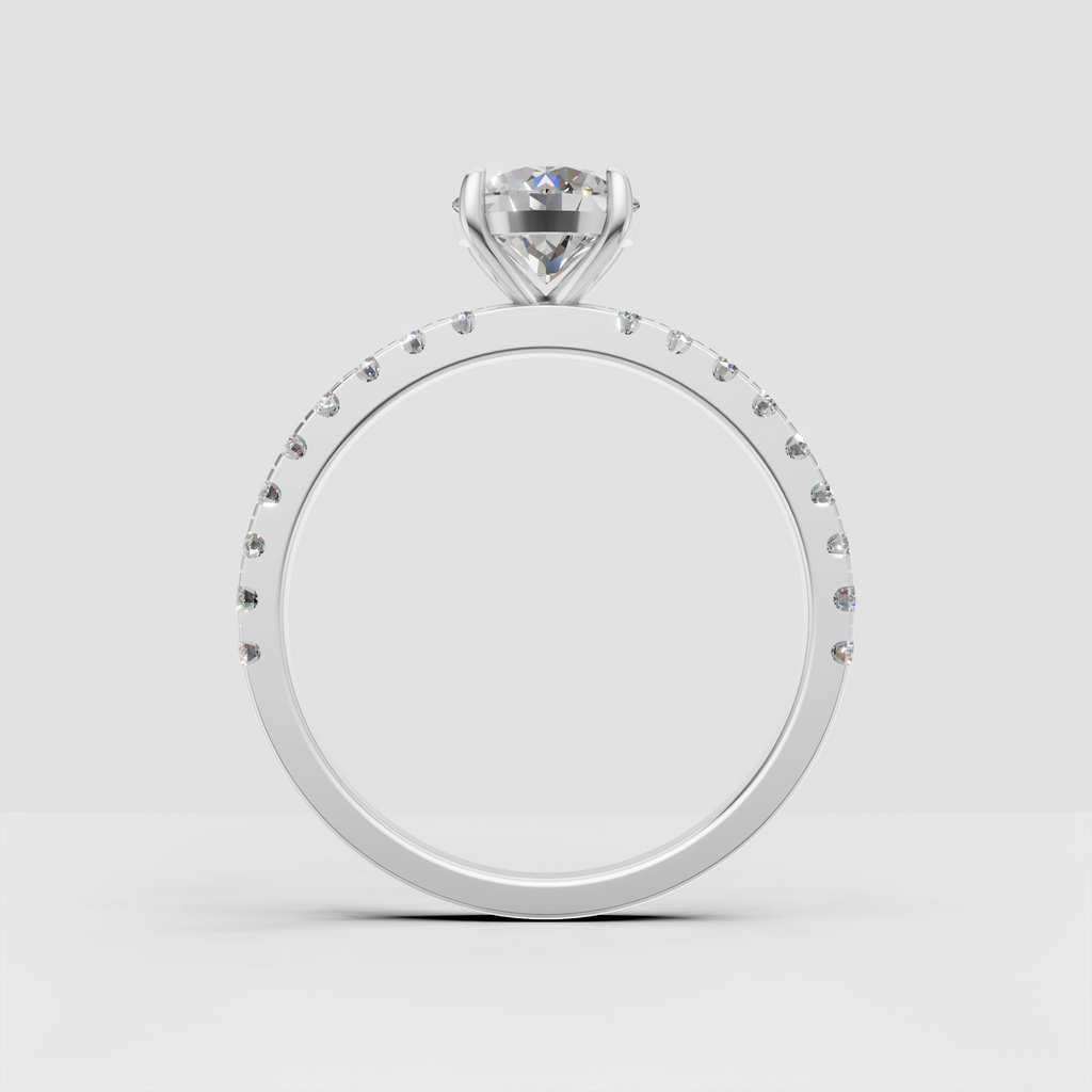 Round diamond engagement ring with continuous pavé accents