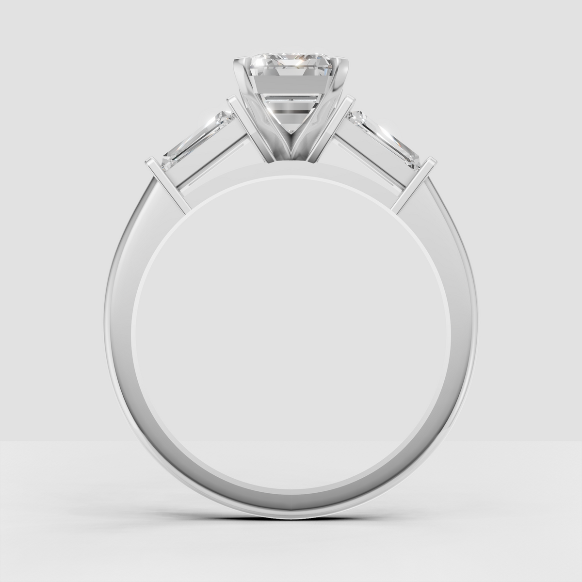 Step-cut emerald diamond ring with polished yellow gold setting