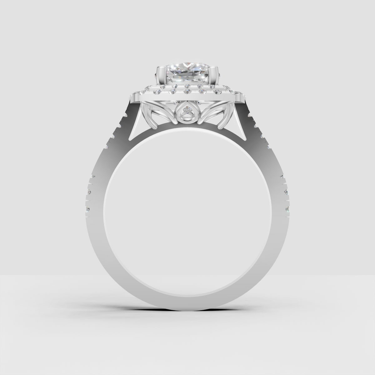 Cushion cut center stone surrounded by two diamond halos