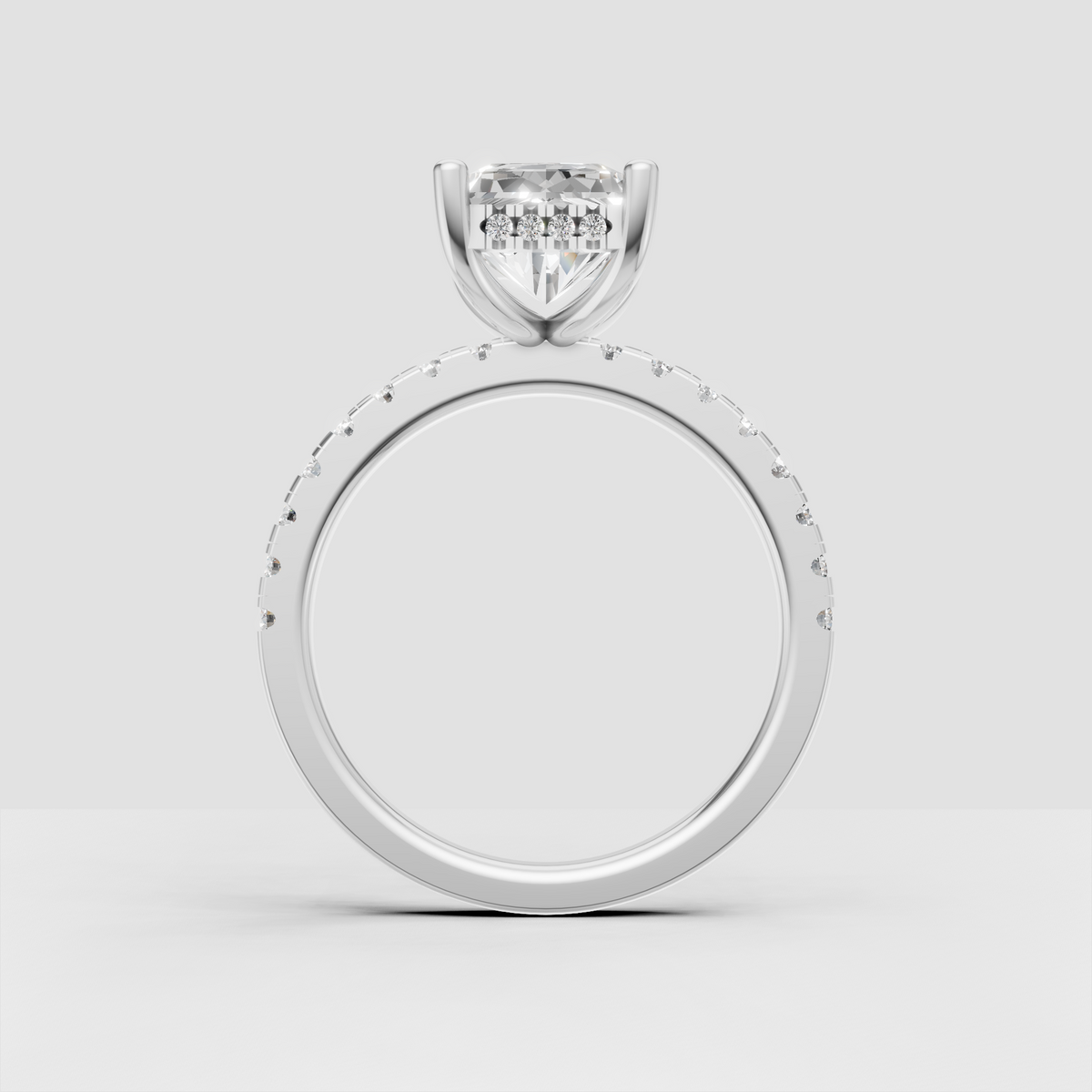Radiant cut diamond ring viewed from the side showing hidden halo