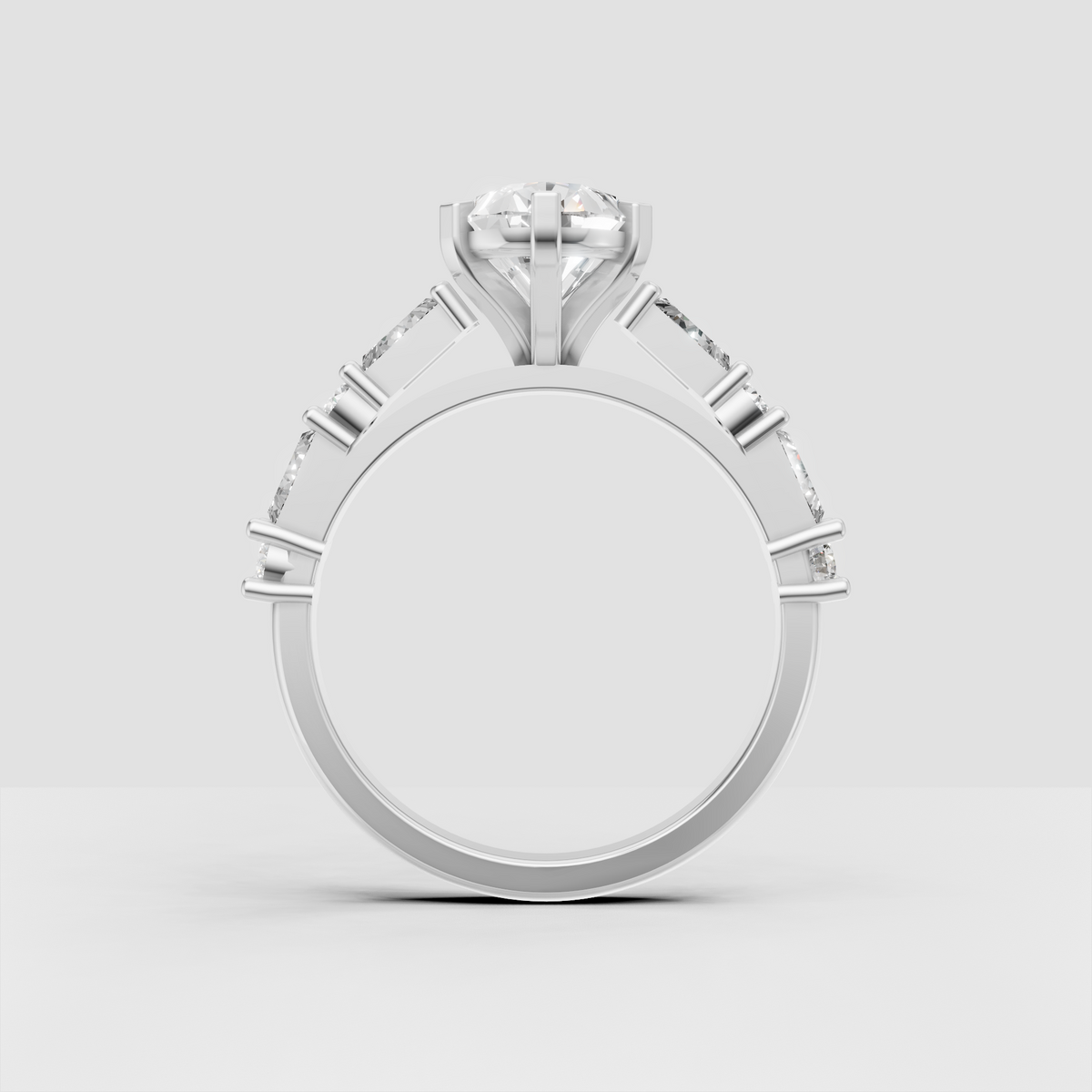 Modern pear diamond engagement ring with brilliant side stones