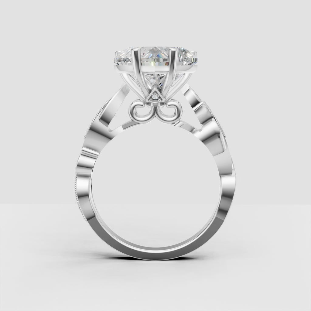 Heart cut diamond prong ring with flowing ribbon-style shoulders