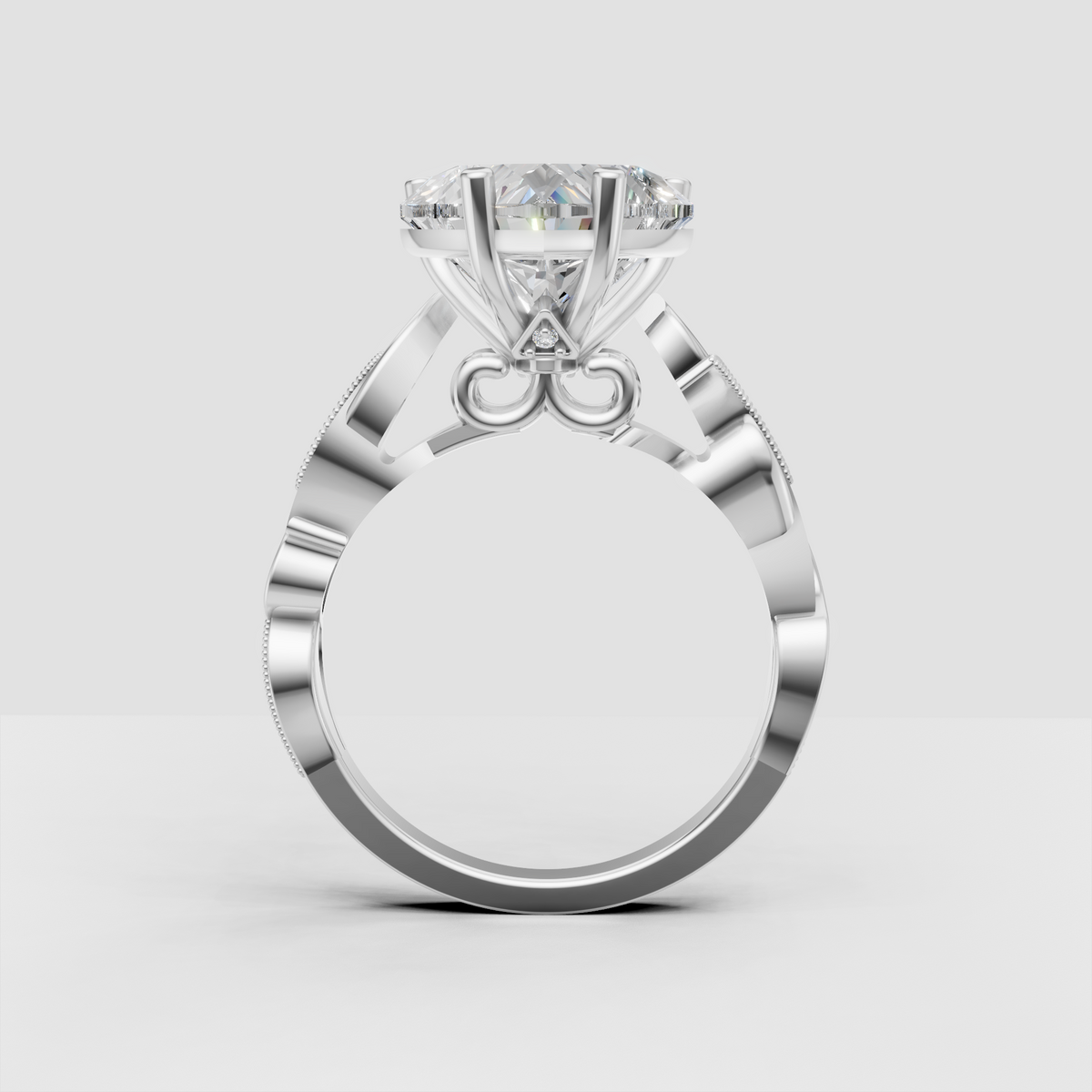 Heart cut diamond prong ring with flowing ribbon-style shoulders
