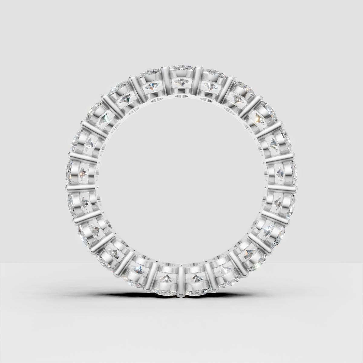 Sophisticated oval diamond eternity ring for stacking