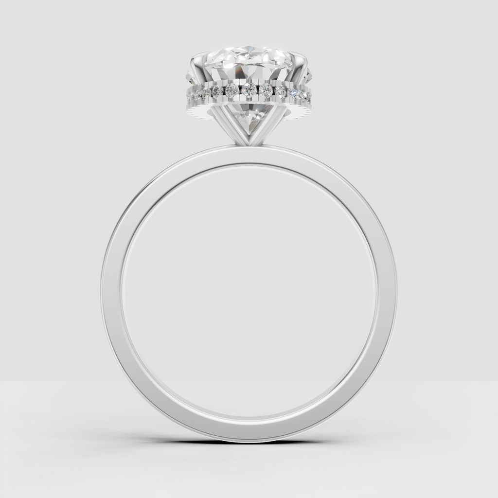 Oval diamond ring with round diamond hidden halo