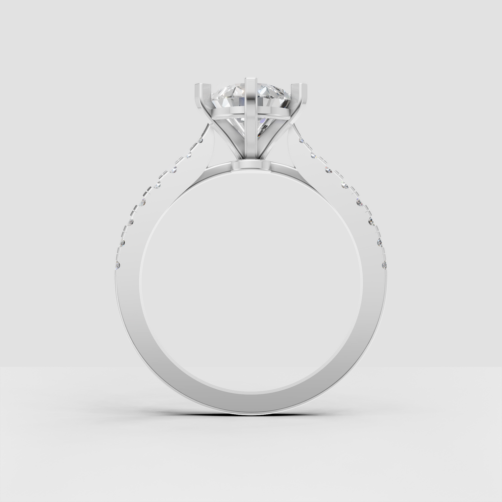 Front view of pear-shaped diamond engagement ring with pavé band