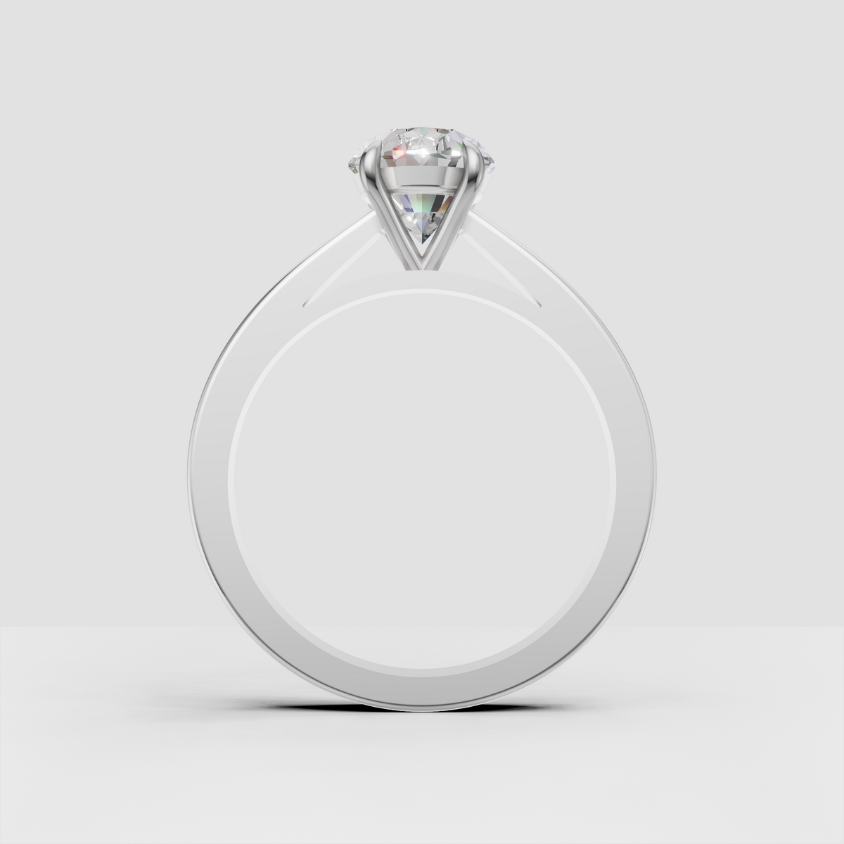 Oval diamond engagement ring with polished gold band