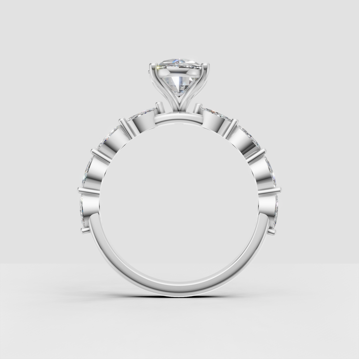 Oval diamond bridal ring with four-prong open-gallery setting
