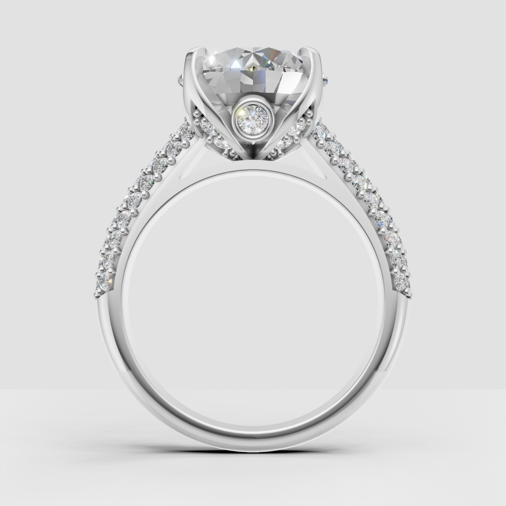 Round brilliant center diamond ring with detailed pavé shoulders