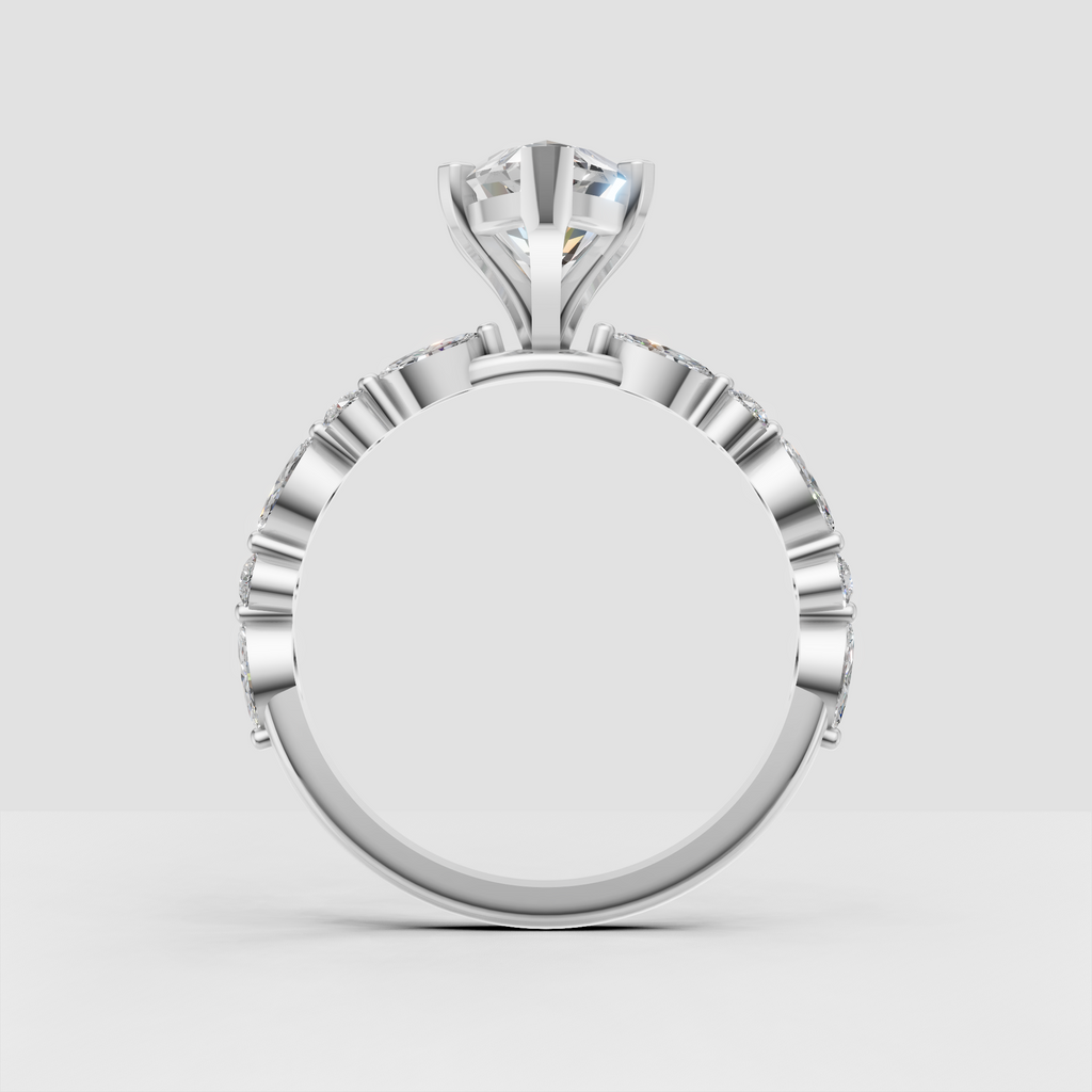 Unique marquise engagement ring with delicate pave side stones and polished band.