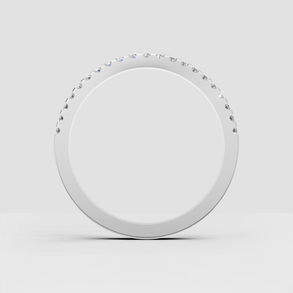 Slim yellow gold wedding band featuring round cut diamonds