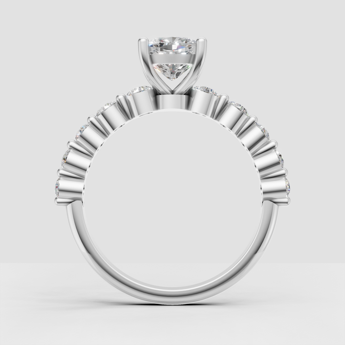 Luxury yellow gold cushion engagement ring with sparkling shoulders