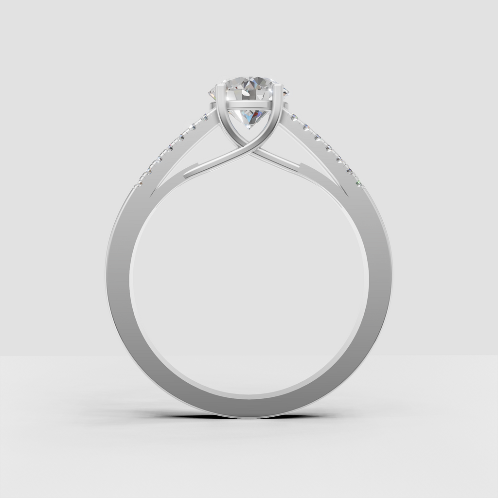 Round diamond engagement ring with open gallery and split shank