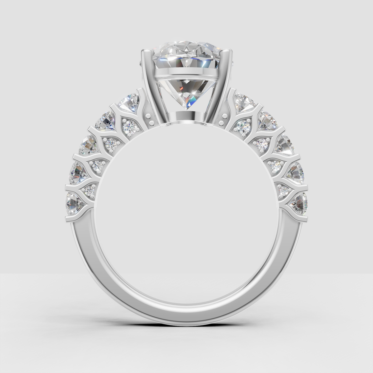 Yellow gold pear cut engagement ring with floral detailing