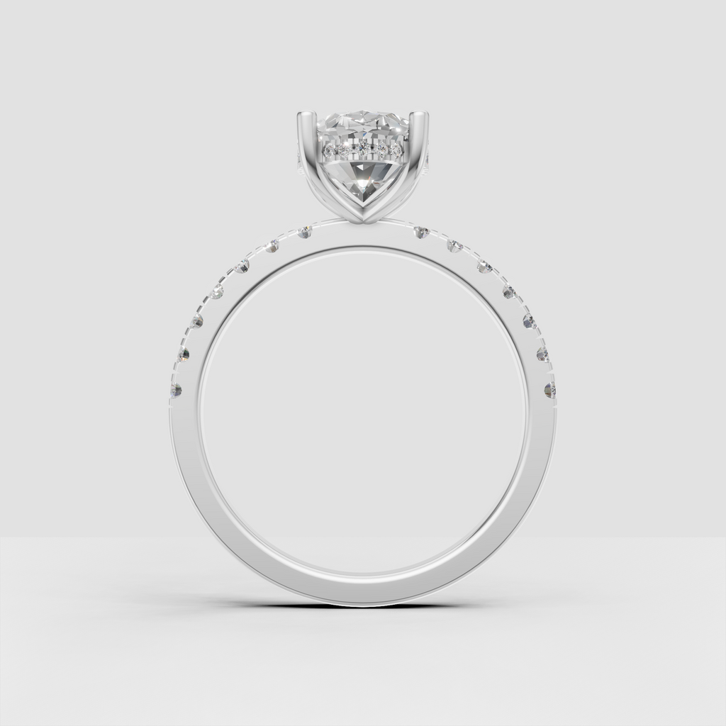 Oval center stone hidden halo ring with yellow gold pavé band