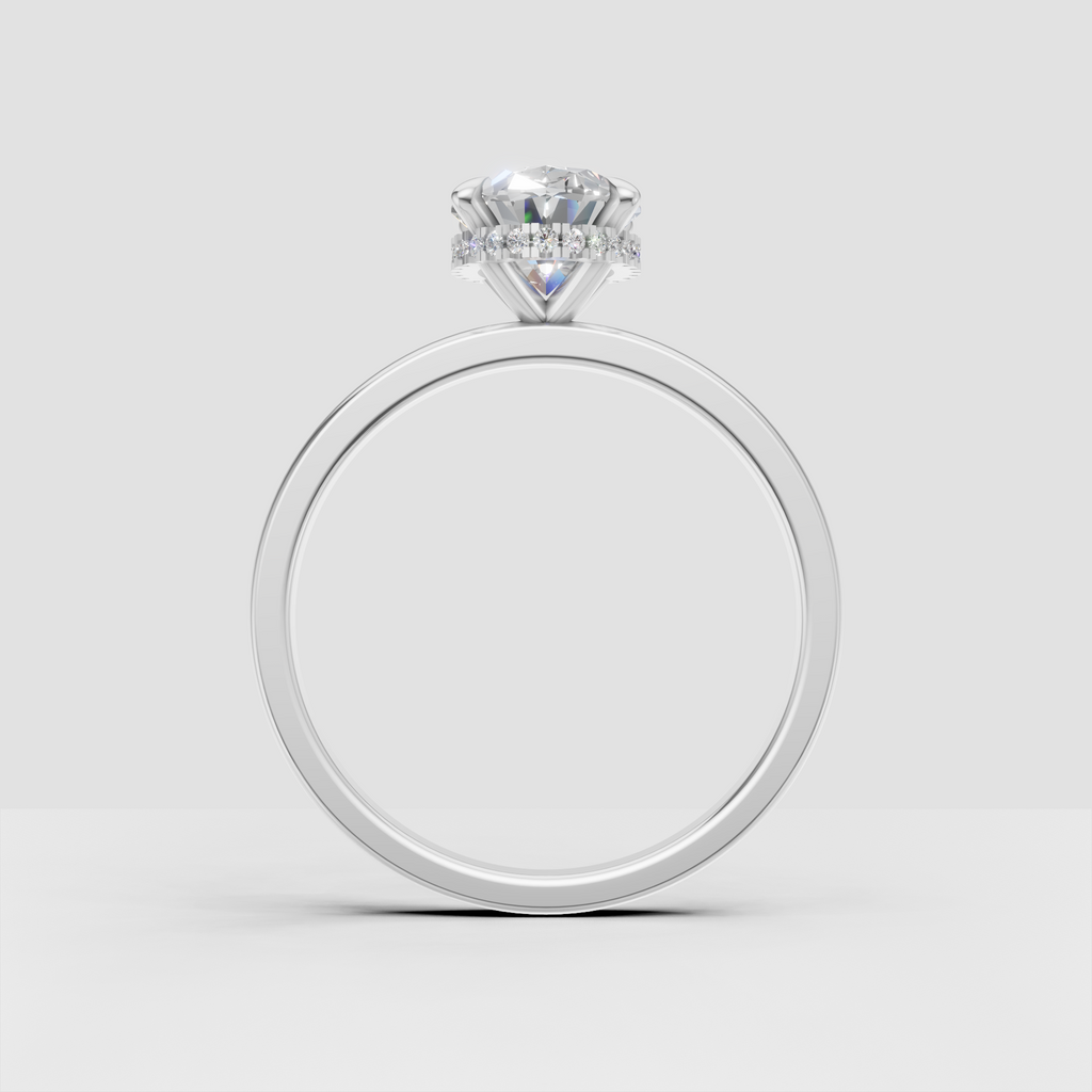 Classic oval diamond engagement ring with hidden halo