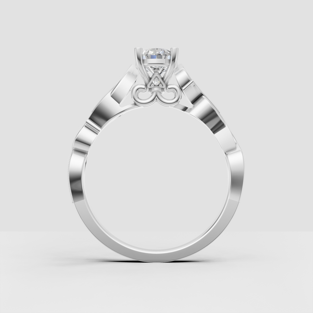 Vintage style pear diamond ring with delicate accent diamonds