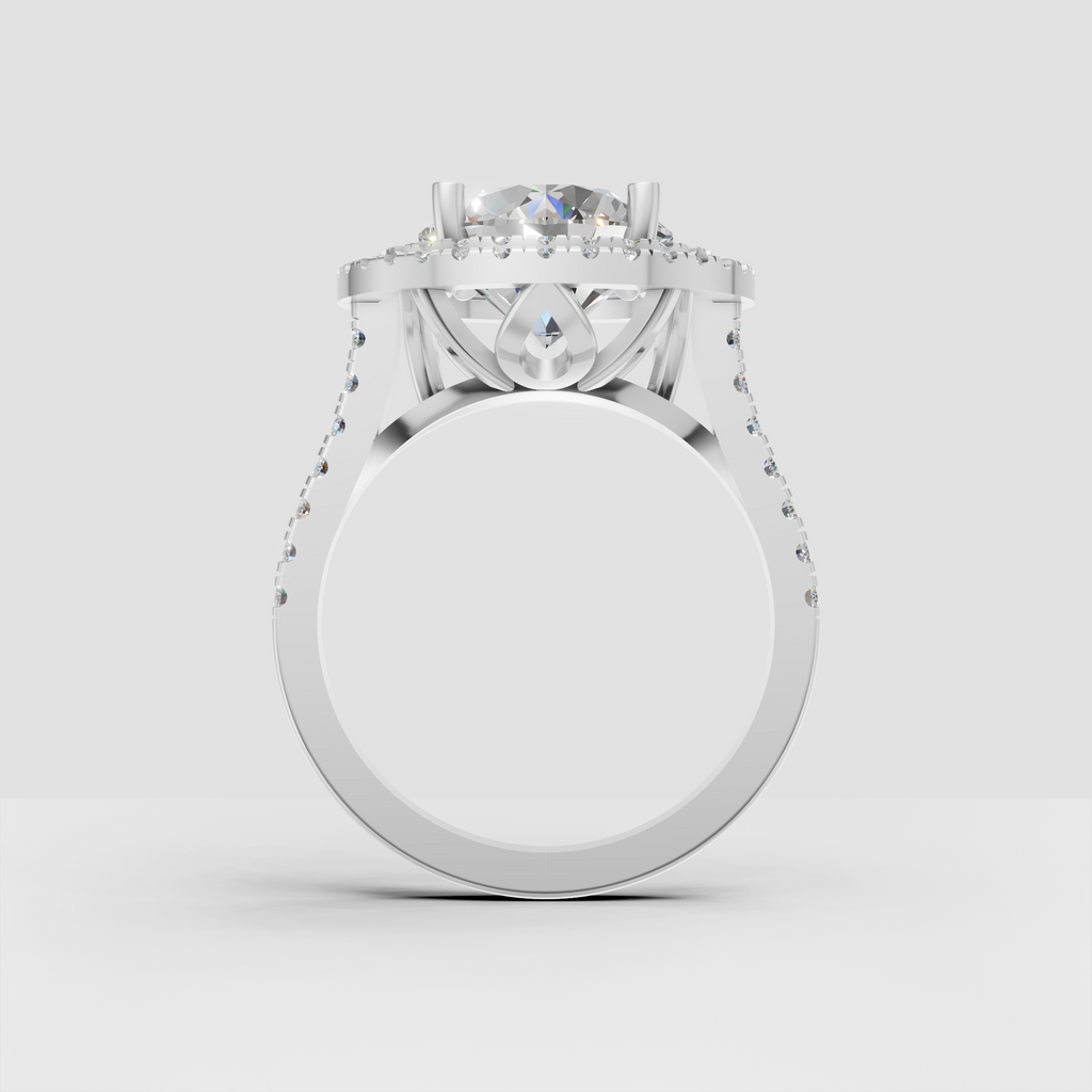Round diamond engagement ring featuring double pavé halo setting