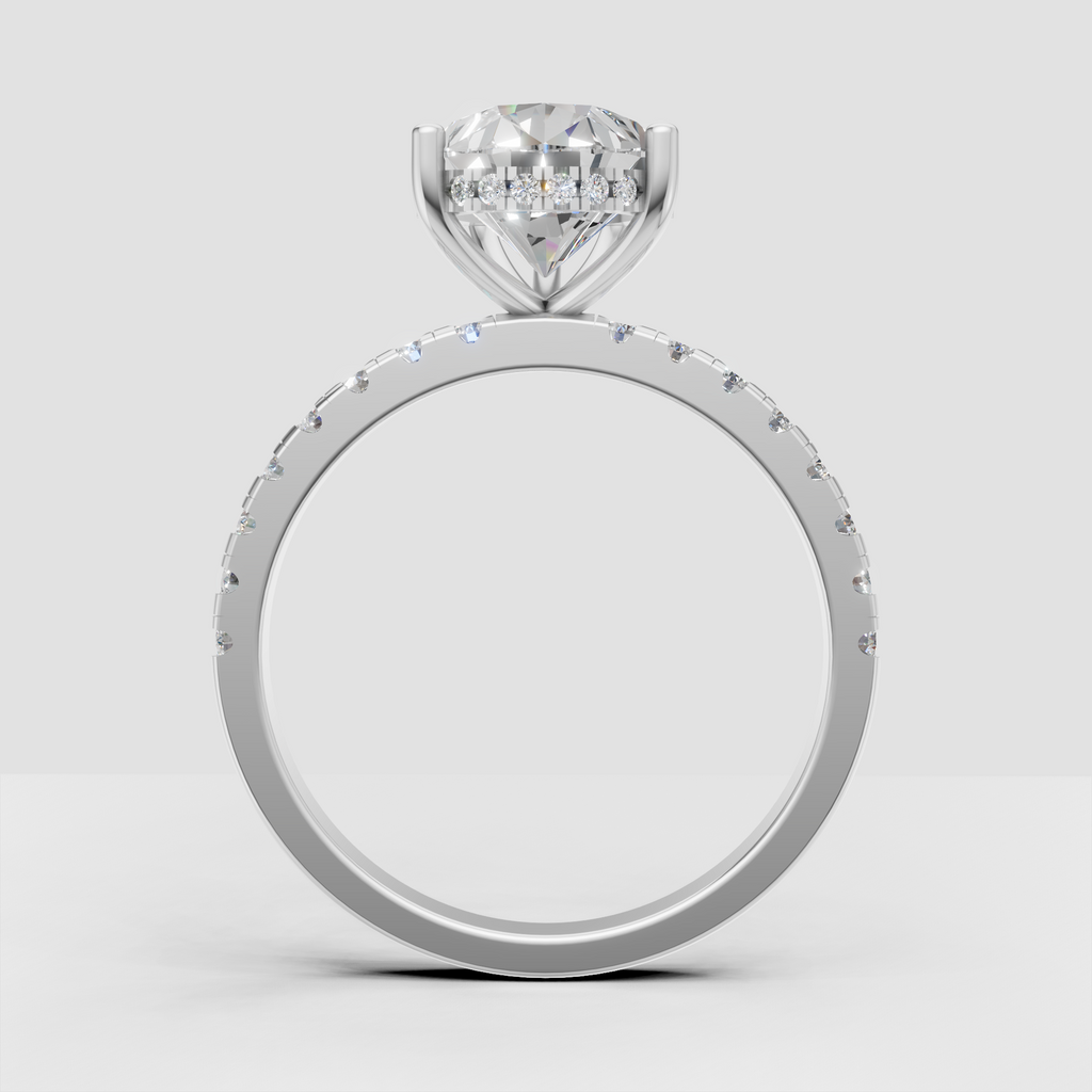 Pear Diamond engagement ring with elegant four-prong setting and pavé band