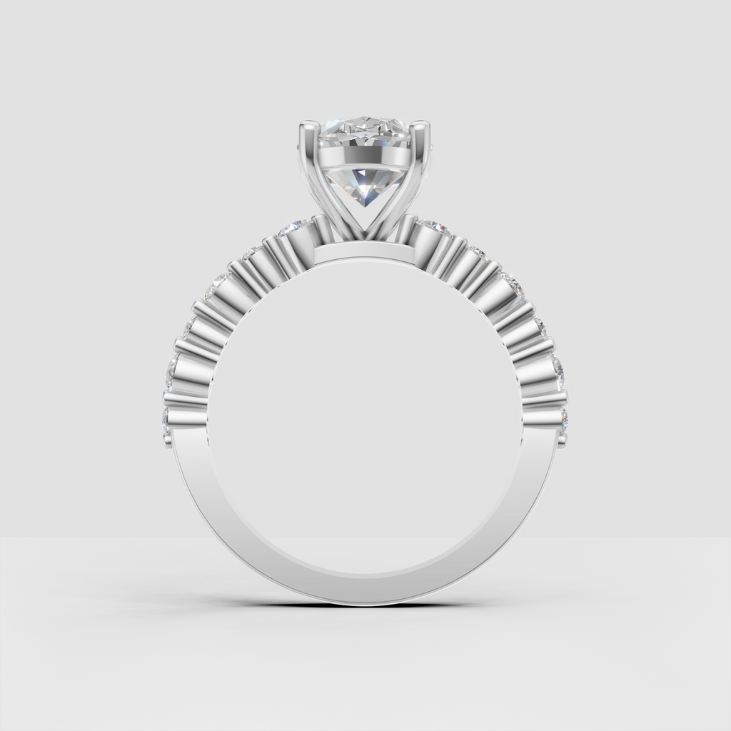 Oval diamond engagement ring with delicate side stones