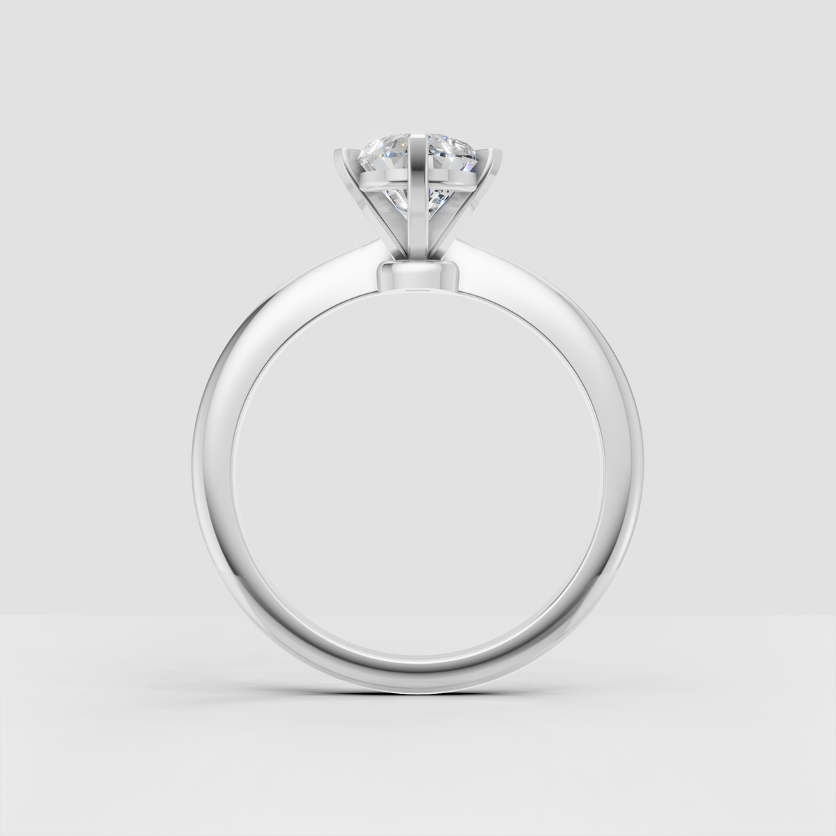 Pear cut diamond ring showing open under-gallery and elevated setting