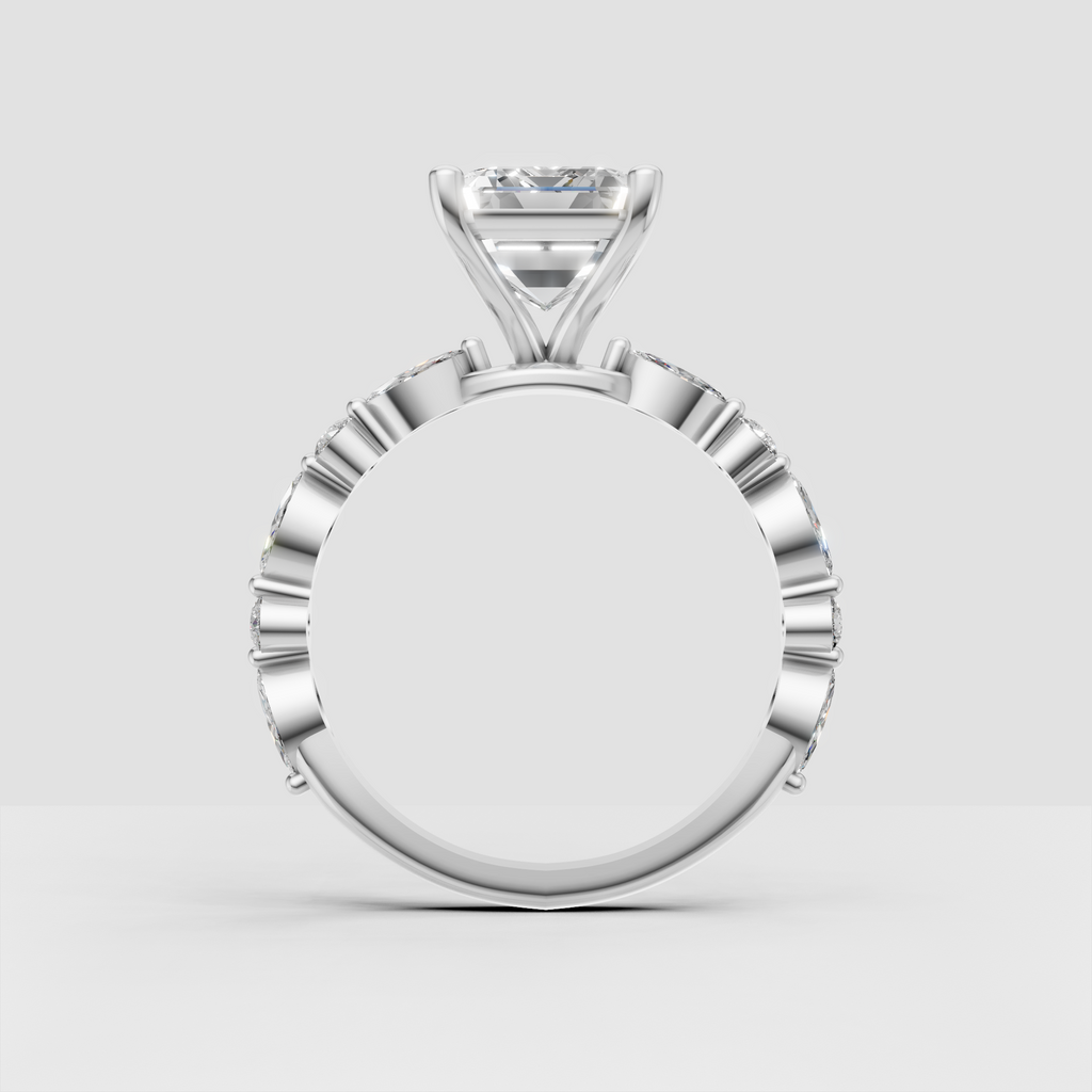 Split shank emerald cut engagement ring in yellow gold