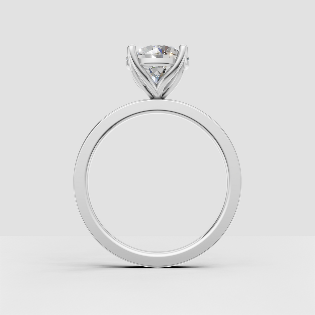 Round brilliant engagement ring with elevated four-prong setting