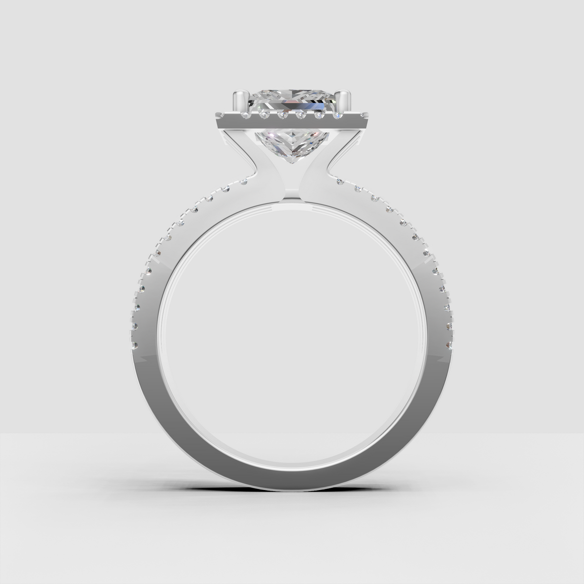 Princess diamond ring featuring round accent stones