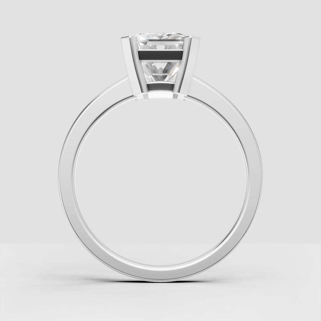 Classic emerald diamond solitaire ring