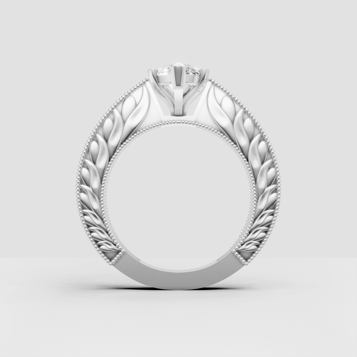 Marquise diamond ring with beaded milgrain-style edging