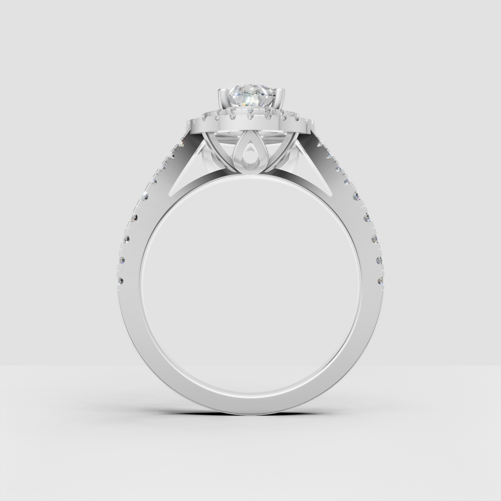 Pear canter diamond ring with triple halo design