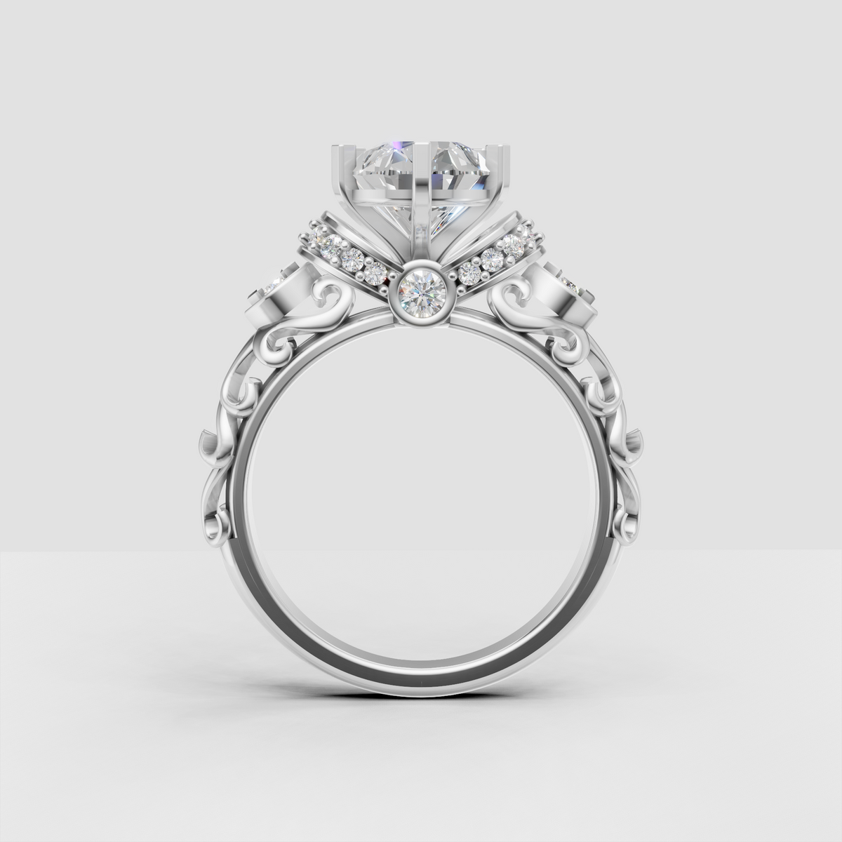 Pear diamond ring featuring vintage filigree scrollwork and milgrain details
