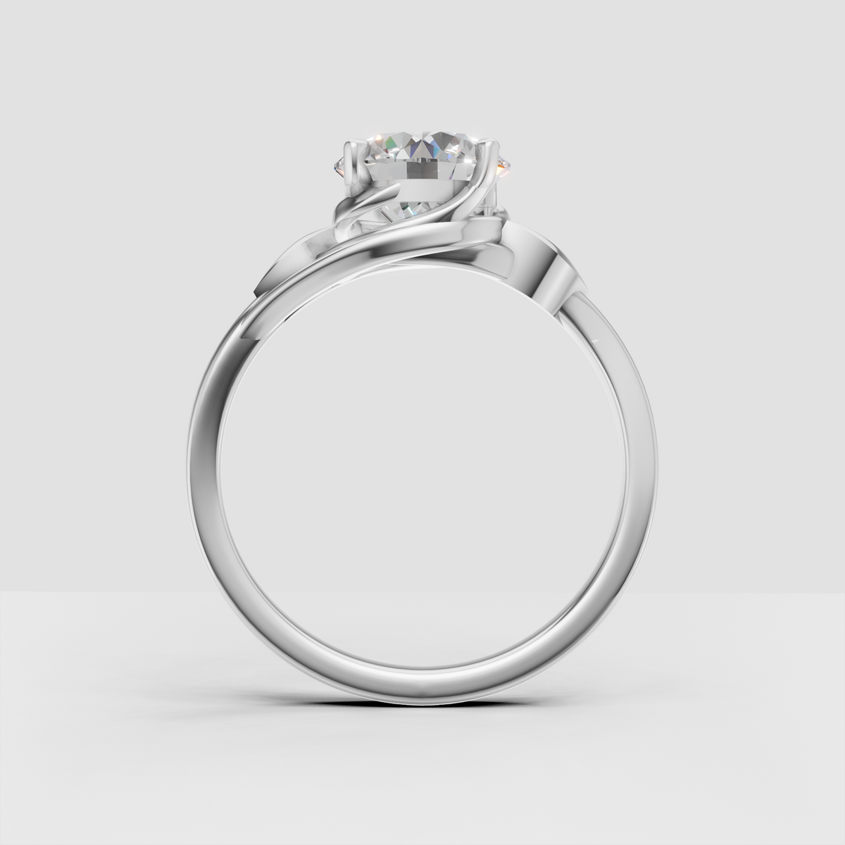 Round diamond ring featuring graceful leaf shaped band detailing