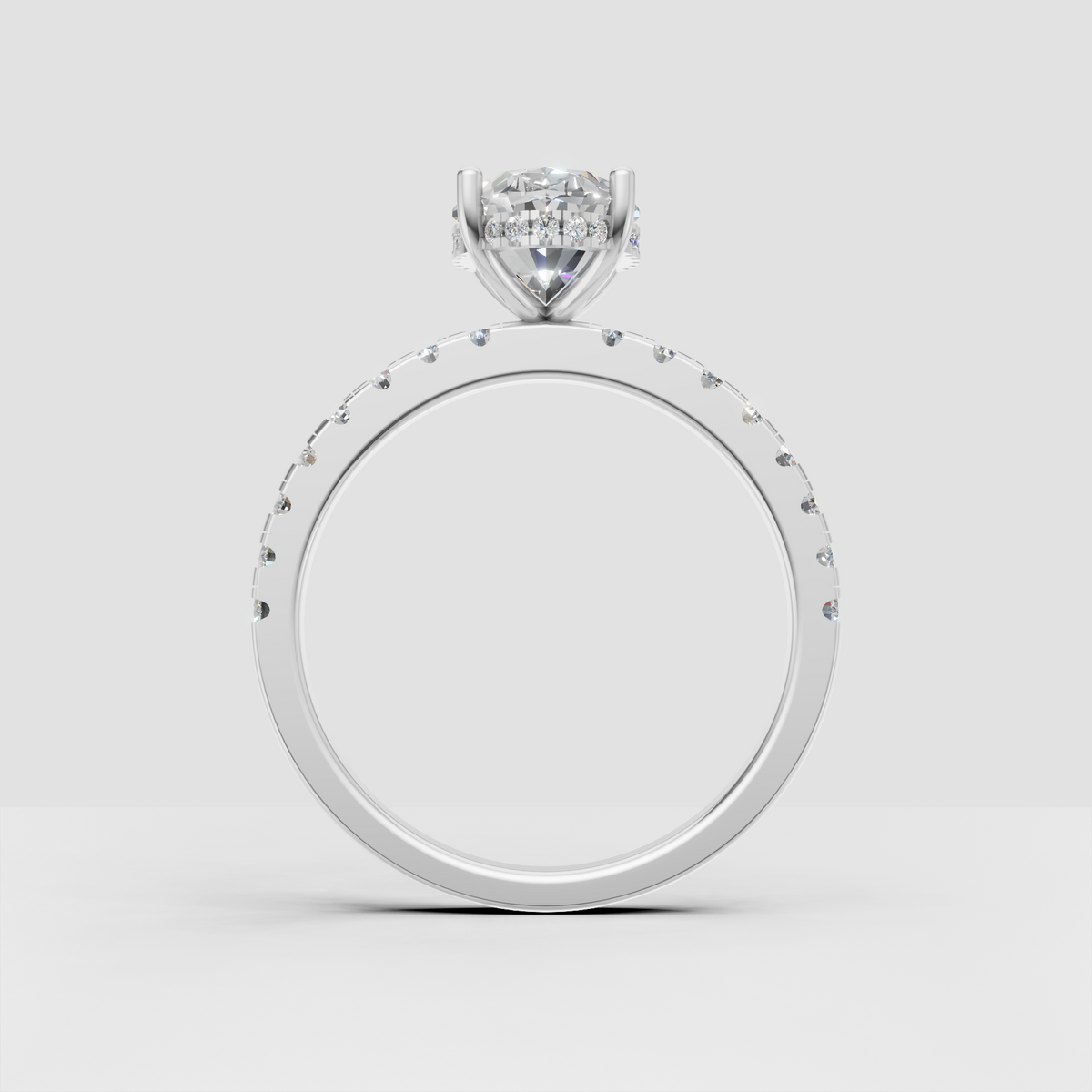 Front view of pear cut diamond engagement ring with polished yellow gold setting