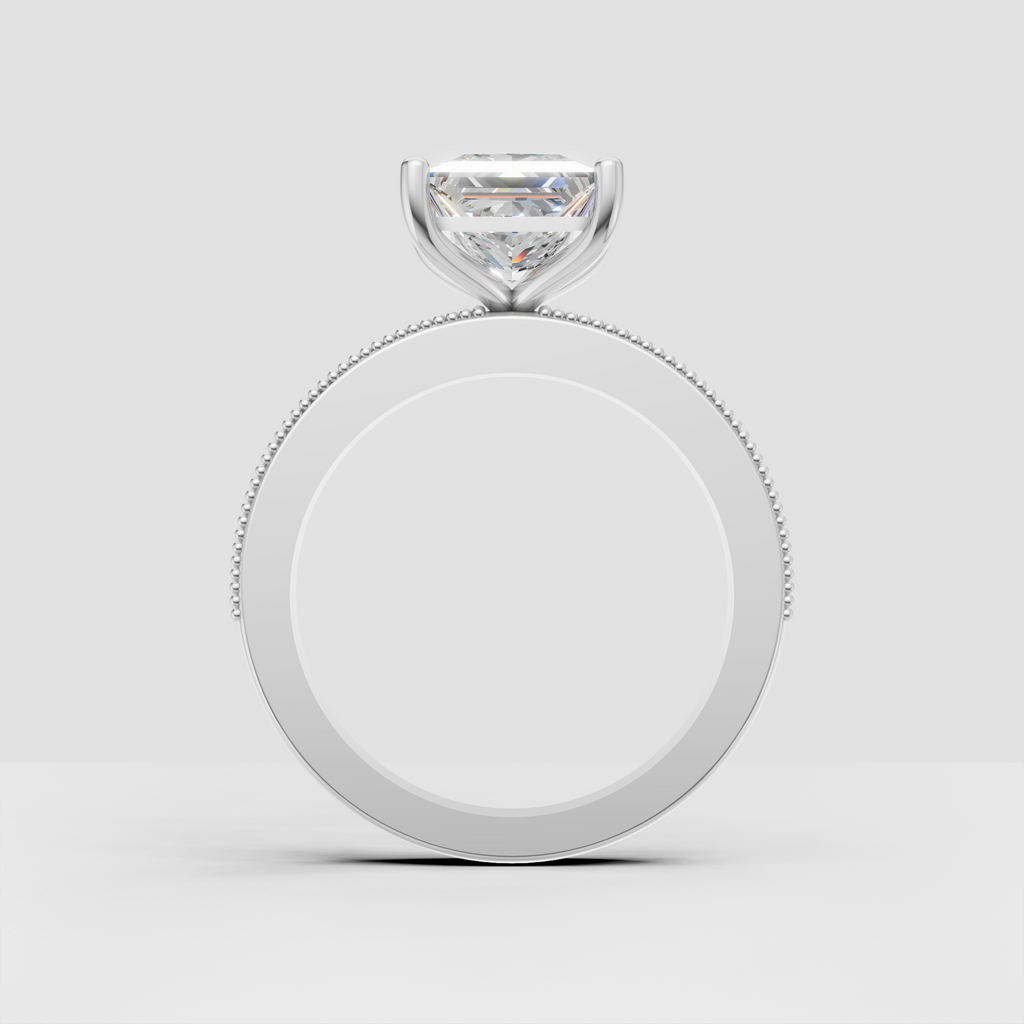 Princess-cut diamond ring viewed from the front with symmetrical four-prong setting